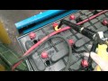 How to fill a forklift battery with water