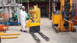 JUNGHEINRICH EME 114 BATTERY OPERATORED POWER PALLET TRUCK LIFTER FOR SALE IN KARACHI PAKISTAN