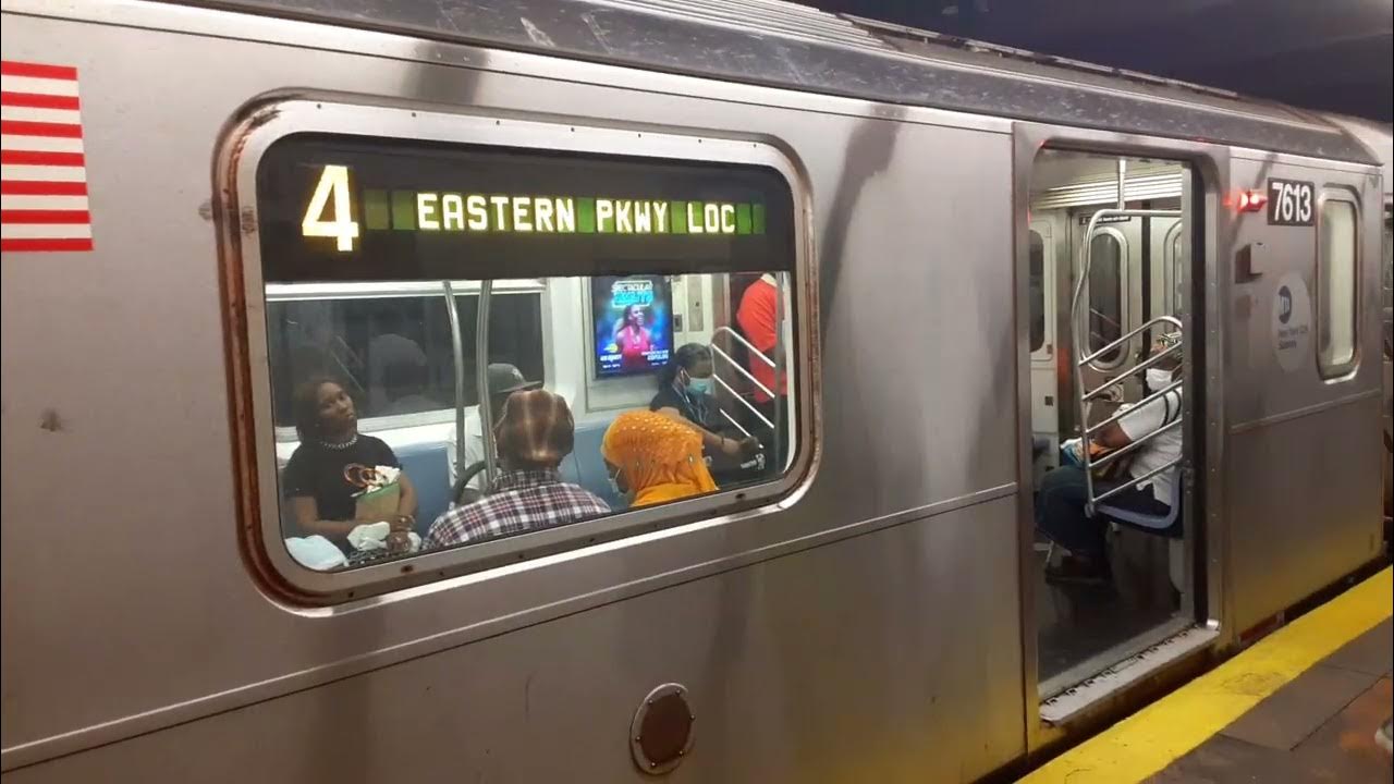 R142A 4 train at Nostrand Avenue to Manhattan and Bronx bound this