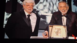 Francis Ford coppola gives an honorary palme d'or to George Lucas