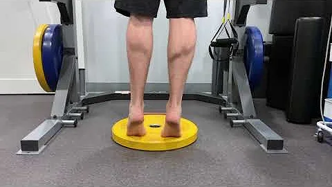 Eric Walper, Physiotherapist, demonstrates a calf ...