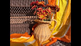 : Wicker newsprint Pitcher             