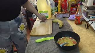 Tuesday breakfast is eggs and bacon and ripe plantains with bread