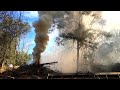 Land Clearing: Piling up and burning a giant brush pile