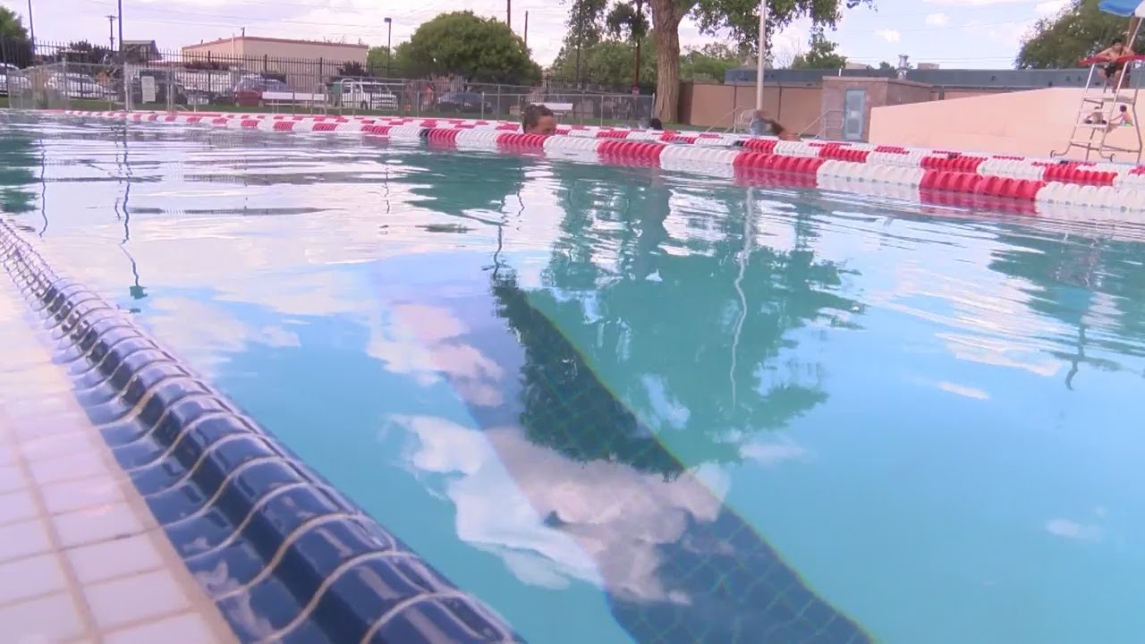 Albuquerque's outdoor city pools try to stay warm amidst cool spring