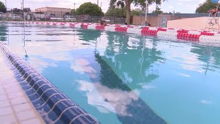 Albuquerque's outdoor city pools try to stay warm amidst cool spring weather