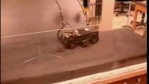 SandBot Moving with Gait Tuned for Granular Media