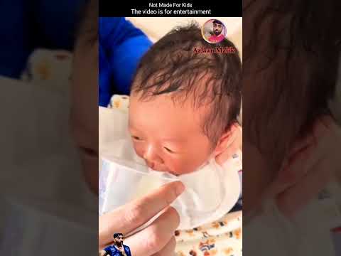 Breast Milk feeding a baby for the first time, pouring mother's milk into a glass. #shorts