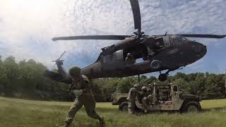 Pennsylvania ANG UH-60 Black Hawk sling loading a Humvee