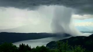 Photographer peter maier captures a jaw-dropping time-lapse of
cloud-burst over lake millstat, austria