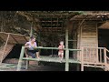 Girl builds bamboo house with thatched roof creates protective railing  single mother