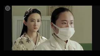 2 Jap Female Nurses are gagged and Stripped disguised by the 2 Chinese female Rebels.