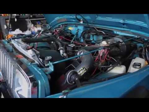 Header and motor mount install on a 1995 Jeep  litre. - YouTube