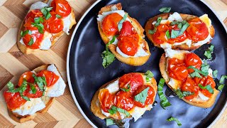 Roasted Garlic, Tomato Toast with Mozzarella, fresh Basil.