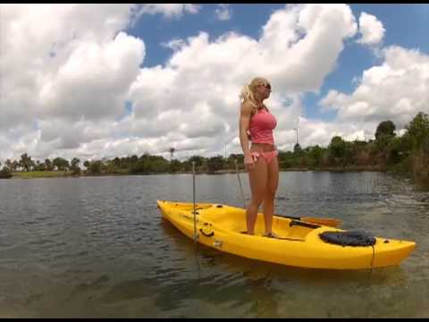 jumping in a kayak using the swivel stick shallow water