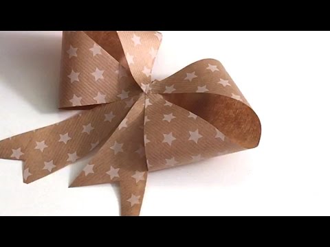 Vidéo: Comment Faire Un Nœud En Papier Pour Décorer Un Cadeau