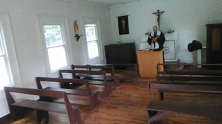 St. Coleman Catholic church, with Rev. Fr. Shawn B...