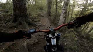 Shredding a downhill bike with a Talaria Sting R behind