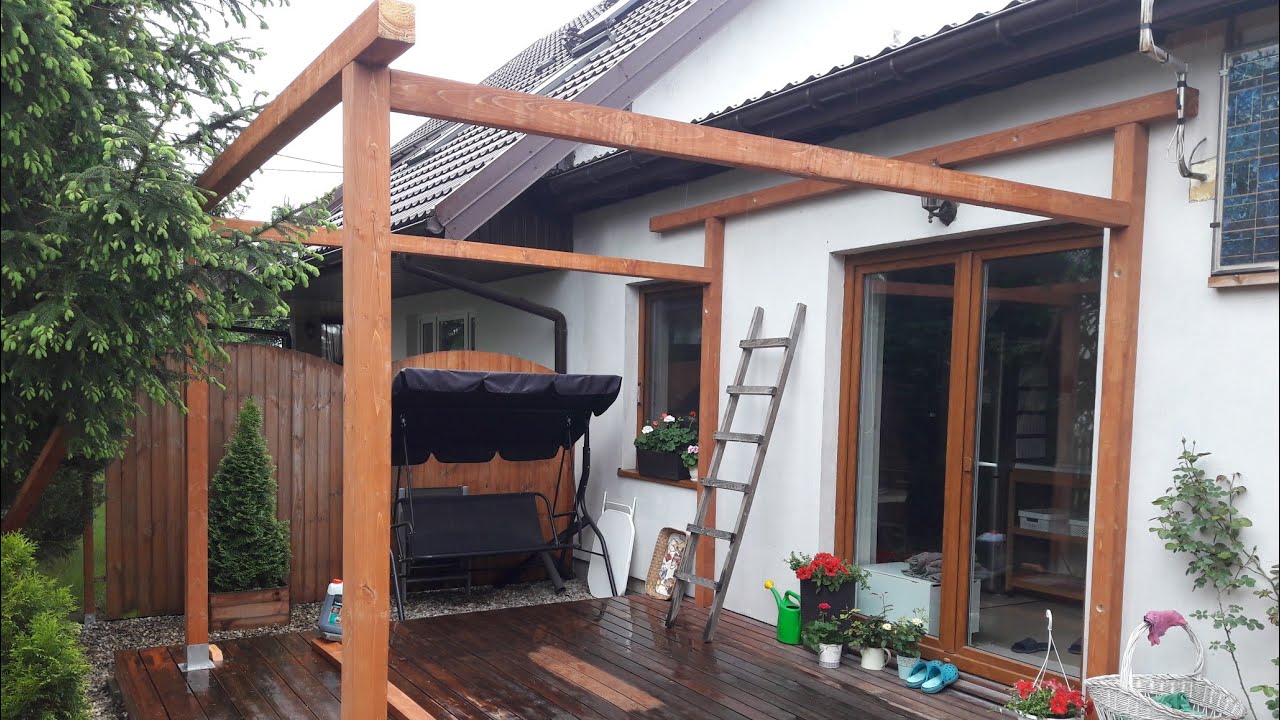 Construction of a terrace roof. Construction gazebo under the roof. Do ...