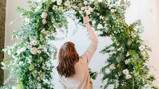 Featuring Japanese flowers from Naniwa, Kaylee designs a beautiful floral arch. The structure is created using a lovely arch from 