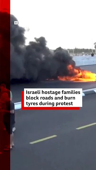 Families of Israeli hostages held by Hamas in Gaza block roads and burn tyres in protest. #BBCNews