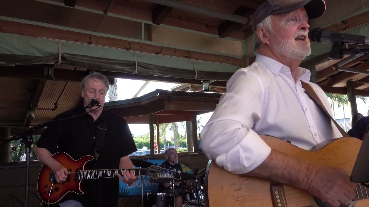 Anna Delgado band Sultans of Swing featuring Bill Marsh.