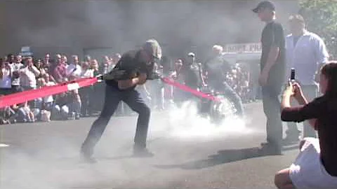 Dennis Rogers Holding Back Harley-Davidsons