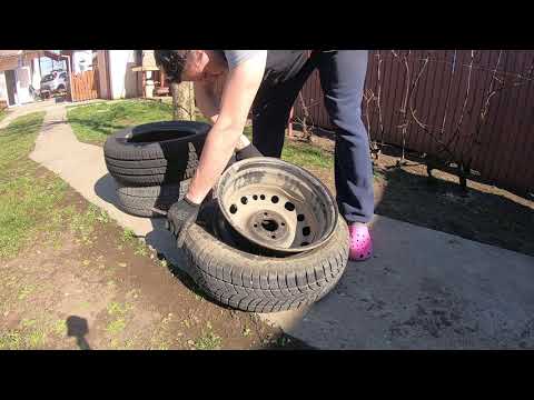 Video: Cum să schimbi o anvelopă pentru camion: 14 pași (cu imagini)