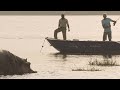 view Fishing for Perch in Nile Crocodile-Filled Waters digital asset number 1