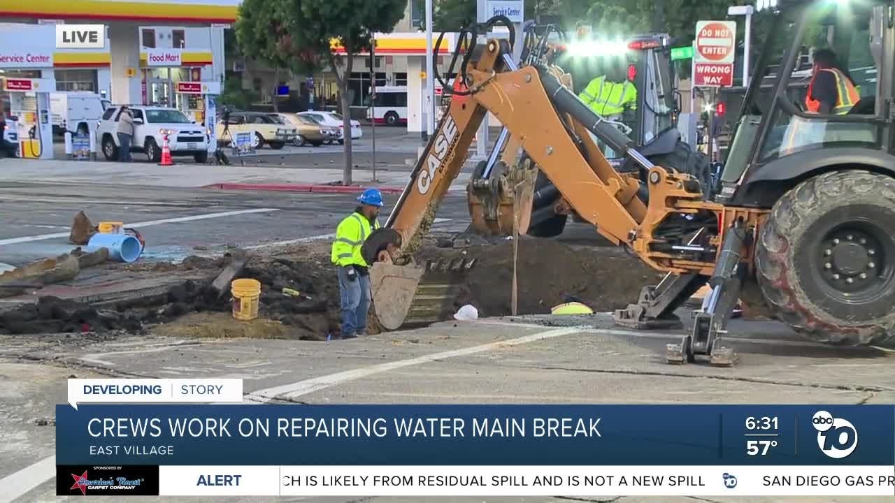 Crews work to repair East Village water main break - YouTube
