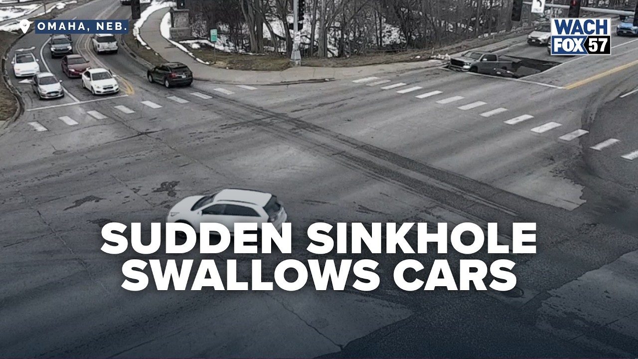 WATCH: Sinkhole opens on road, swallowing two cars in shocking video