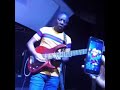 Aleck Macheso playing his bass guitar