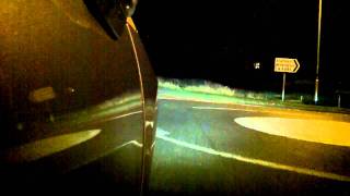 Kodak ZX5 Playsport mounted to outside of car at night using dogcam mount