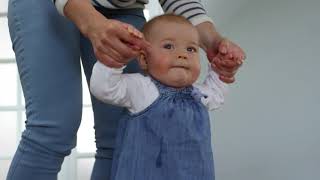 A mother teaching her baby to walk - a beautiful baby, a very beautiful clip