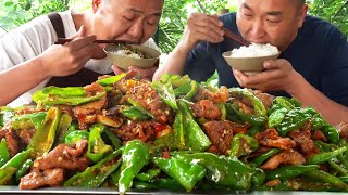 Stirfried pork with 1.5 kilos chillis. Nice and spicy!