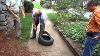 Mark Hare demonstrates inverting a tire