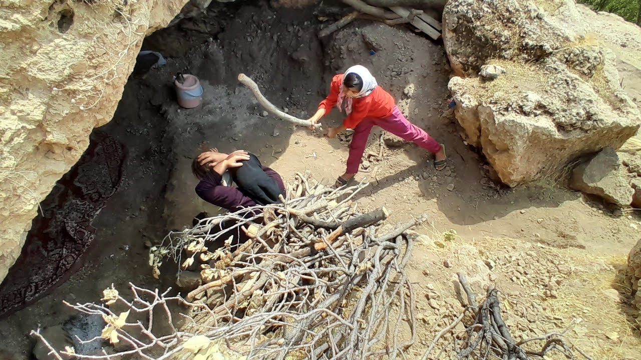 A mother with her children is looking for firewood in an impassable ...