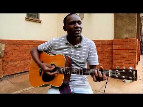 No woman no cry by Bob marley acoustic guitar cover by Kasolo Edwin