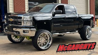 AMAZING Chevy Silverado on 26X14 KG1 Forged wheels with a 9” McGaughys lift kit