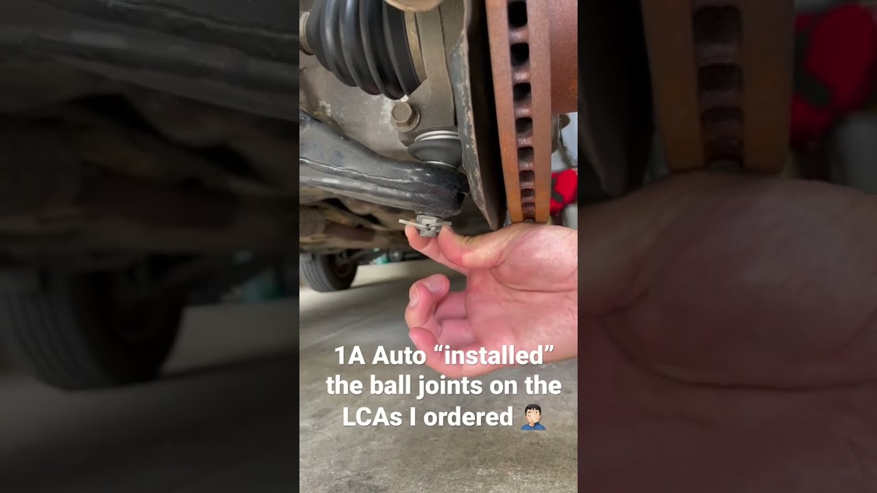 Ball joints on both control arms were hand tight and had cotter pins already installed. 