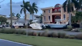 Boats litter the streets of Treasure Island after Helene slammed into Florida