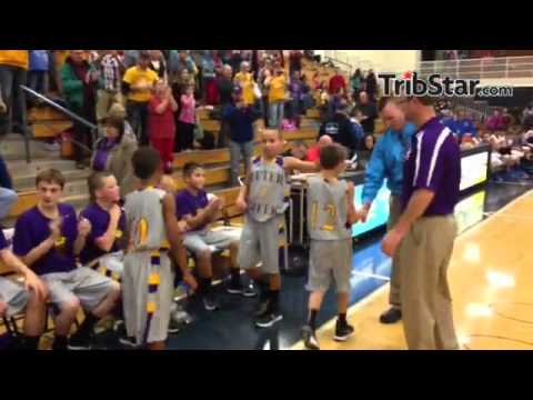 Otter Creek Middle School sixth-grade boys basketball celebrates its county championship win at TH N