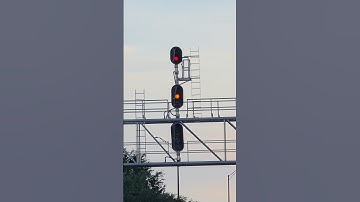 A Medium Approach Medium railroad signal formation in action.