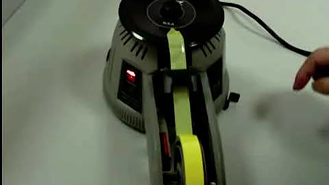 Automatic tape cutting machine.