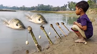 fish caughting in the river of india- it is very beautiful view- A children is the caught 5 fishes