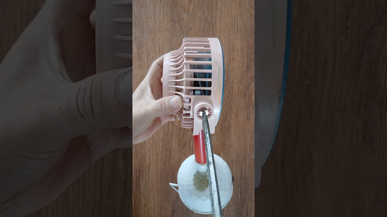 Transform a broken clip-on mini fan into a homemade desk fan.