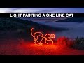 Light painting a one line cat