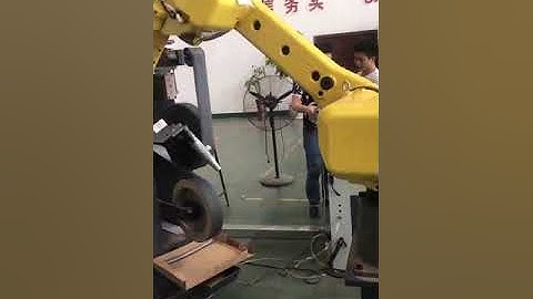 Automatic Grinding machine with Robot- 2 Manipulators