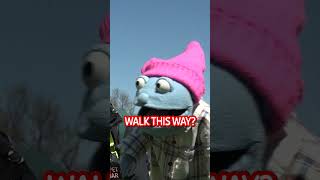 Protestors oppress innocent blue puppet