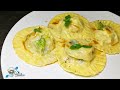 Ravioli fatti in casa farciti con patate  gamberi e erbe aromatiche